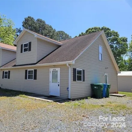 Rent this 3 bed house on 167 Kluttz Street in Locust, Stanly County