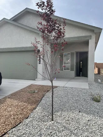 Rent this 3 bed house on Longs Peak Road Northeast in Rio Rancho, NM