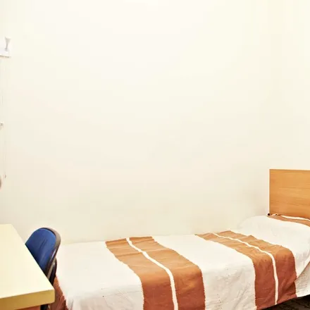 Rent this 4 bed room on Carrer d'Aragó in 08001 Barcelona, Spain