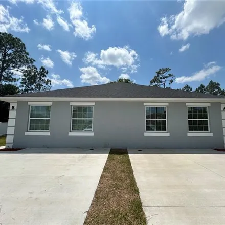 Rent this 3 bed house on 899 Savona Place in Osceola County, FL 34758