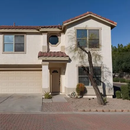 Rent this 4 bed house on 6080 South Bell Place in Chandler, AZ 85249