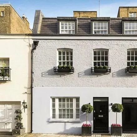 Buy this 3 bed townhouse on Eaton Mews North in London, SW1X 8AS
