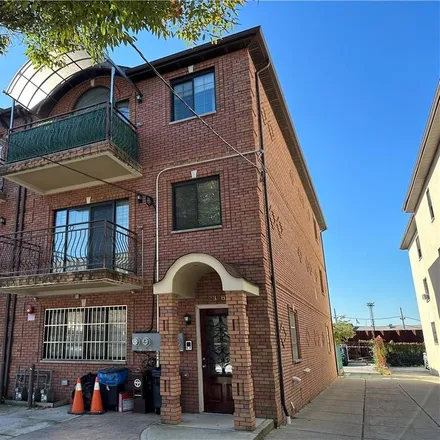 Buy this 8 bed townhouse on 2385 Boynton Place in New York, NY 11223