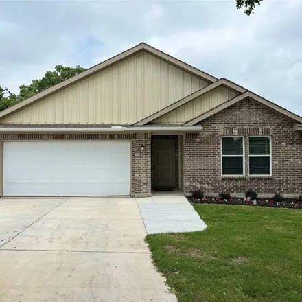 Rent this 4 bed house on 882 East 3rd Street in Springtown, Parker County