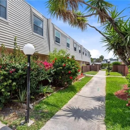 Rent this 2 bed townhouse on 6603 Winfield Blvd in Margate, Florida