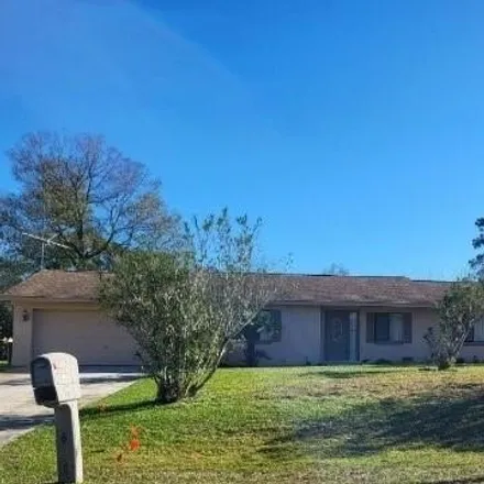 Buy this 3 bed house on 58 Parkview Dr in Palm Coast, Florida