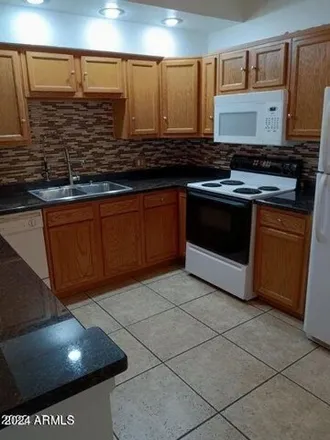 Rent this 3 bed apartment on 351 East Thomas Road in Phoenix, AZ 85012