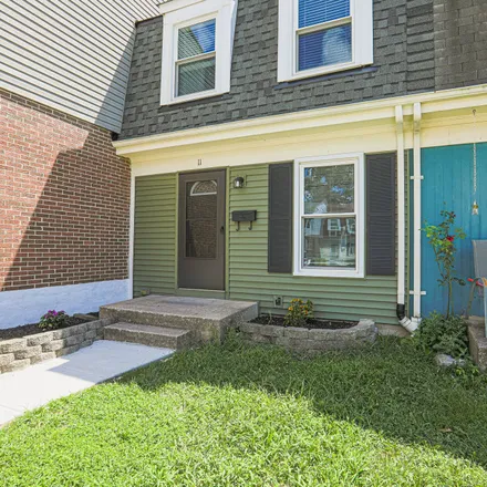 Rent this 3 bed townhouse on 11 Pawleys Court in Carney, MD 21236