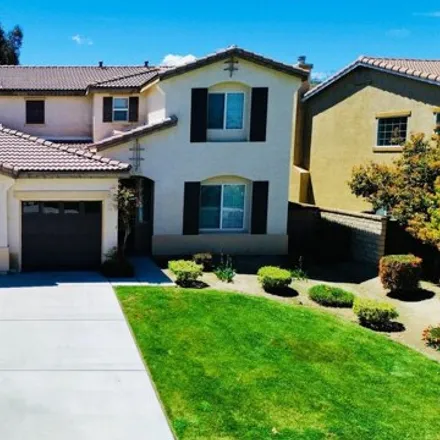 Rent this 4 bed house on 2302 Cornflower Way in Palmdale, CA 93551