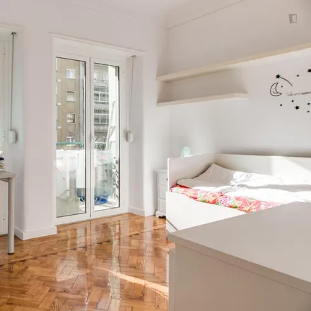 Rent this 6 bed room on Avenida de Roma in 1700-341 Lisbon, Portugal