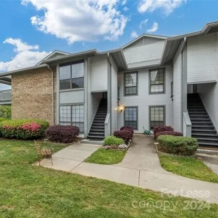 Rent this 2 bed condo on 5816 Harris Grove Lane in Charlotte, NC 28212