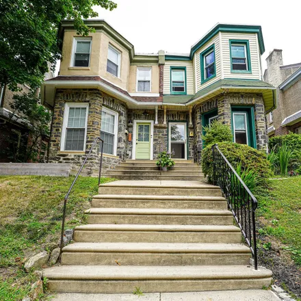 Buy this 3 bed townhouse on 6211 Wayne Avenue in Philadelphia, PA 19144