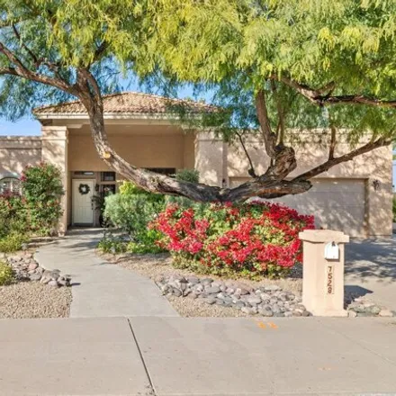 Buy this 4 bed house on 7526 East Windrose Drive in Scottsdale, AZ 85260