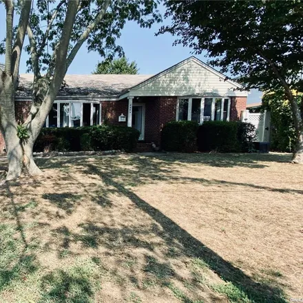 Buy this 4 bed house on 2453 Coolidge Avenue in North Bellmore, NY 11710