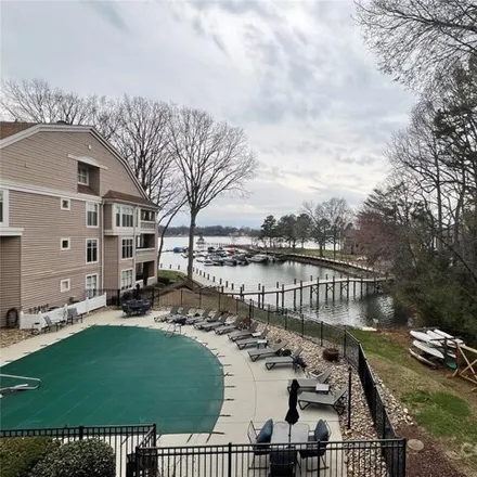 Rent this 2 bed condo on 617 Portside Drive in Davidson, NC 28036
