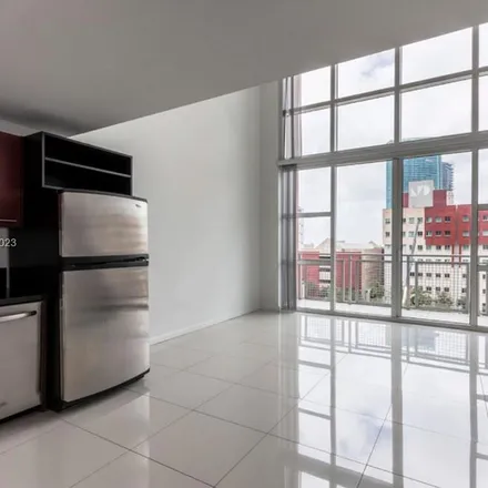 Rent this 1 bed apartment on T-Mobile in 244 Biscayne Boulevard, Torch of Friendship