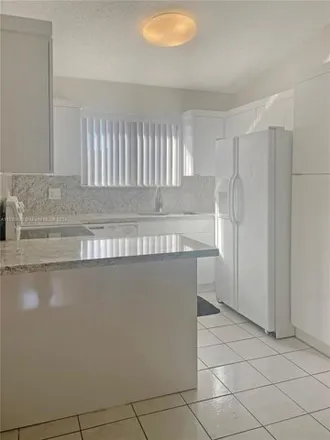 Rent this 2 bed apartment on 5830 West 18th Lane in Hialeah, FL 33012