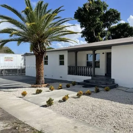 Buy this 4 bed house on 466 East 11th Street in Sun-Tan Village, Hialeah