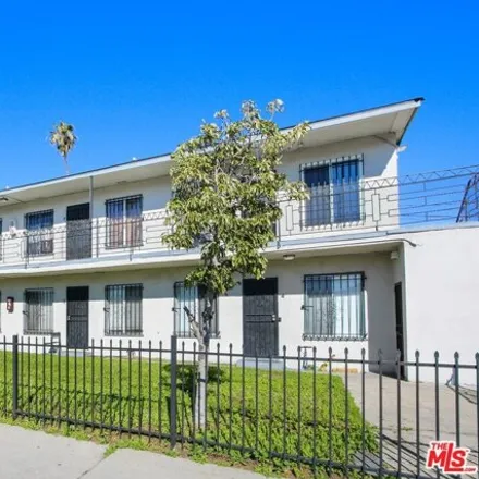 Buy this 8 bed house on 11226 S Figueroa St in Los Angeles, California