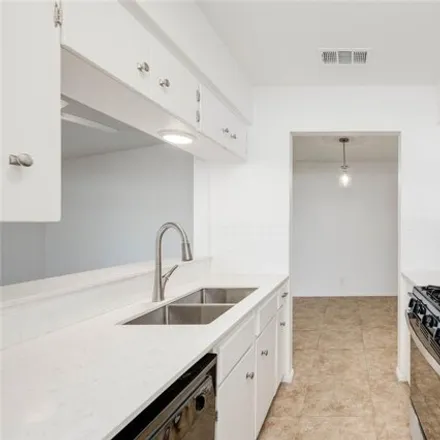Rent this studio apartment on 5902 Emerald Forest Drive in Austin, TX 78745