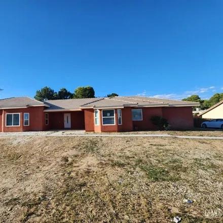 Rent this 4 bed house on 1481 Monte Vista Avenue in Rosamond, CA 93560
