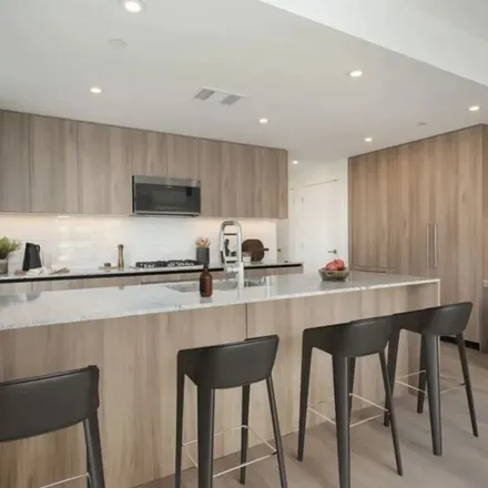 Rent this 2 bed apartment on 6955 Santa Monica Boulevard in Los Angeles, CA 90038