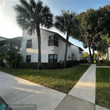 Buy this 3 bed condo on Northwest 22nd Street in Coconut Creek, FL