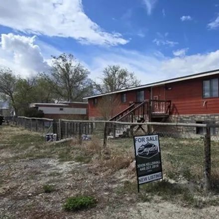 Buy this 4 bed house on 142 West 6th Street in Shoshoni, WY 82649