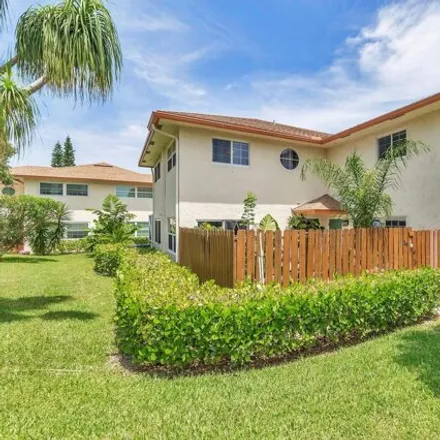 Rent this 2 bed townhouse on Villas on the Green in Jupiter, FL