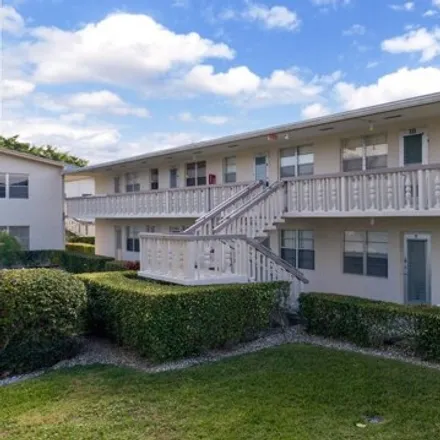 Rent this 2 bed condo on 136 Cambridge F Unit 136 in West Palm Beach, Florida