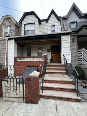 Buy this 3 bed house on 78-24 68th Ave in Middle Village, New York