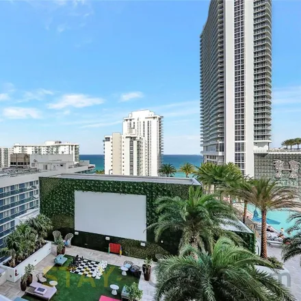 Rent this 2 bed condo on 4010 South Ocean Drive