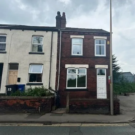 Rent this 3 bed townhouse on 41 Warrington Road in Wigan, WN1 3AJ