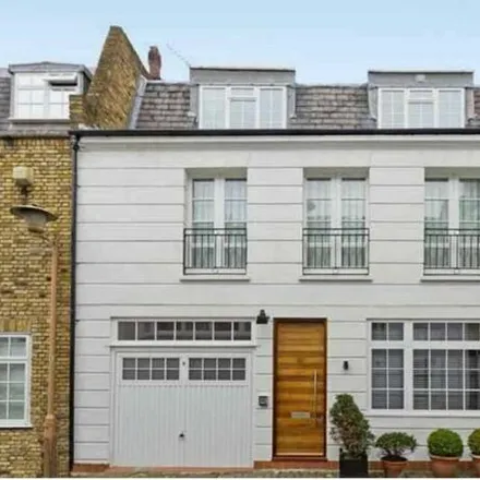 Rent this 3 bed townhouse on 3 Belsize Park Mews in London, NW3 5BL