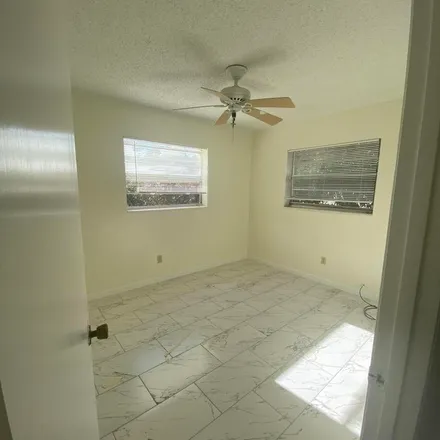 Rent this 3 bed apartment on Home Street in Palm Beach County, FL 33406