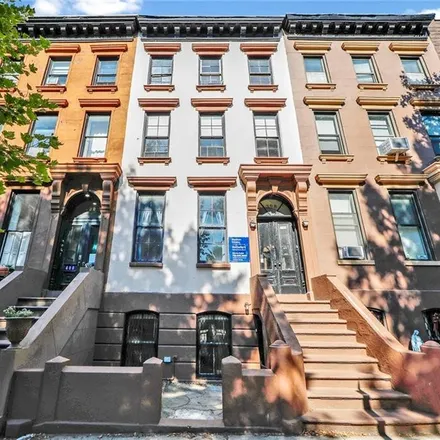Buy this studio townhouse on 398 Henry Street in New York, NY 11201