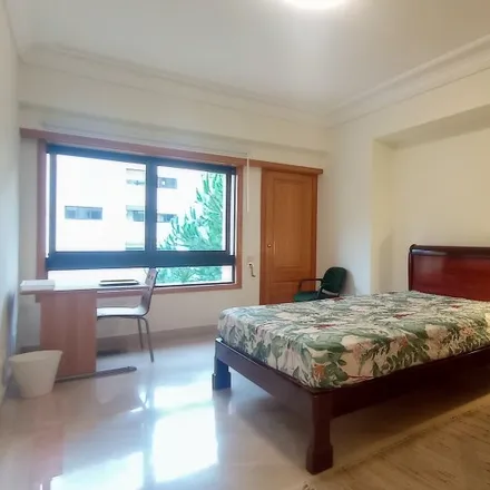 Rent this 5 bed room on Musaxi in Rua Padre Américo, 1600-864 Lisbon