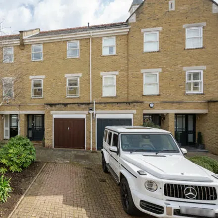 Buy this 4 bed townhouse on Stott Close in London, SW18 2TG
