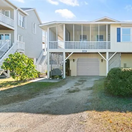 Buy this 3 bed house on 1 Gone Shrimpin' in 314 Sand Dune Lane, Holden Beach