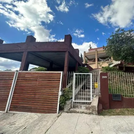 Buy this 7 bed house on Los Lapachos in Departamento Punilla, Villa Carlos Paz