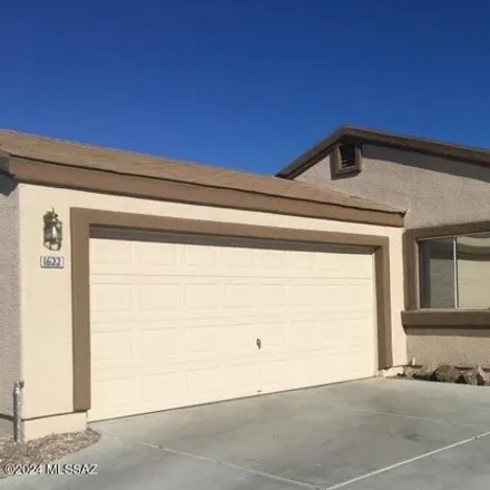 Rent this 3 bed house on 1570 West Bitter Orange Street in Flowing Wells, AZ 85705