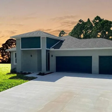 Buy this 4 bed house on 3255 Aspen Road Southeast in Palm Bay, FL 32909