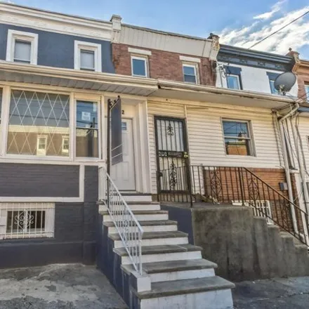 Buy this 3 bed house on 6216 Dickens Avenue in Philadelphia, PA 19142