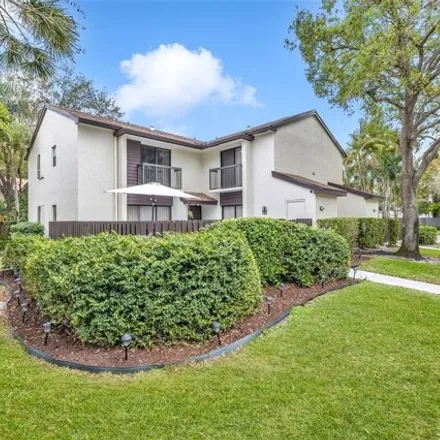 Buy this 2 bed house on 3338 Cocoplum Circle in Coconut Creek, FL 33063