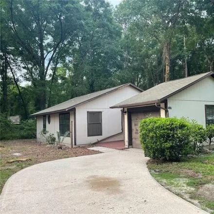 Rent this 3 bed house on 7337 Southwest 21st Place in Alachua County, FL 32607