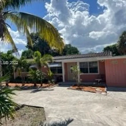 Rent this 3 bed house on 421 Northeast 24th Avenue in Harbor Village, Pompano Beach