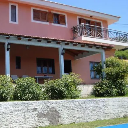 Buy this 5 bed house on Jacarandá in Departamento Punilla, Villa Carlos Paz