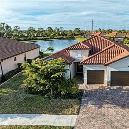 Buy this 4 bed house on Vancanza Drive in North Port, FL 34293