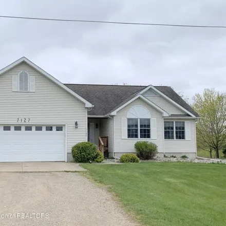 Buy this 4 bed house on 7141 Hartel Road in Benton Township, MI 48876