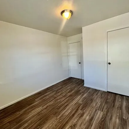 Rent this 2 bed house on T and C Management apartments in 3400 Crest Avenue Southeast, Albuquerque